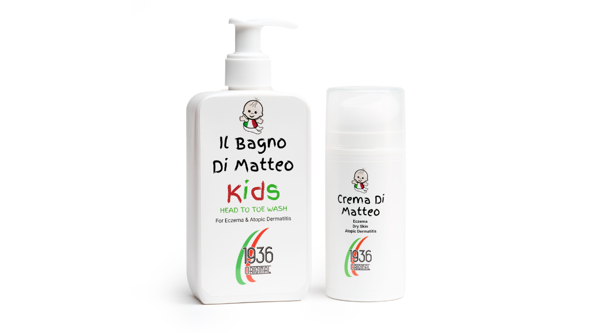 Two bottles of Italian skincare products for kids. The left bottle reads Il Bagno Di Matteo Kids and is a head-to-toe wash for eczema and atopic dermatitis. The right bottle is labeled Crema Di Matteo. Both feature a cartoon baby and a 1936 logo.